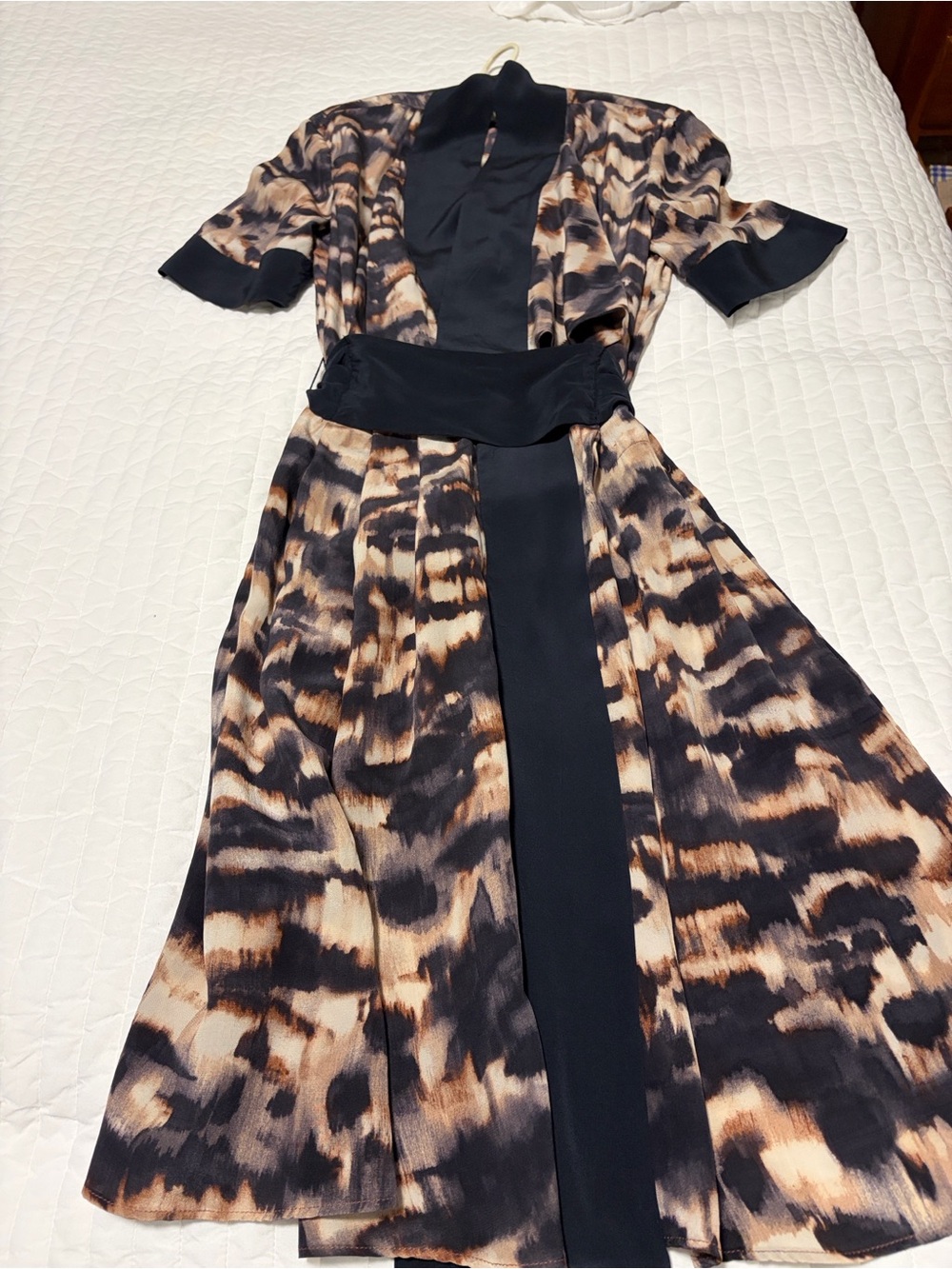 BCBGMAXAZRIA silk print dress. Beige and cream print with dark navy trim.